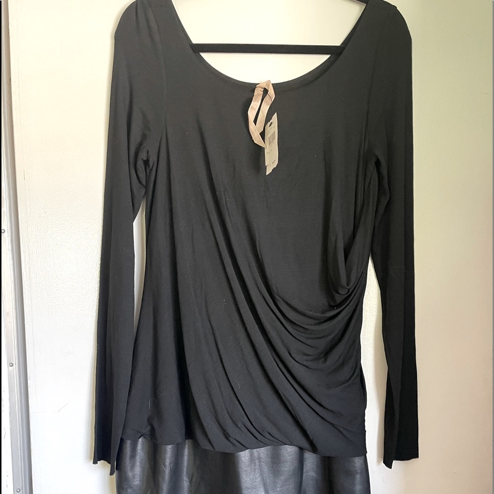 Bailey , long sleeve , fitted foe leather bottom black short dress. Size L